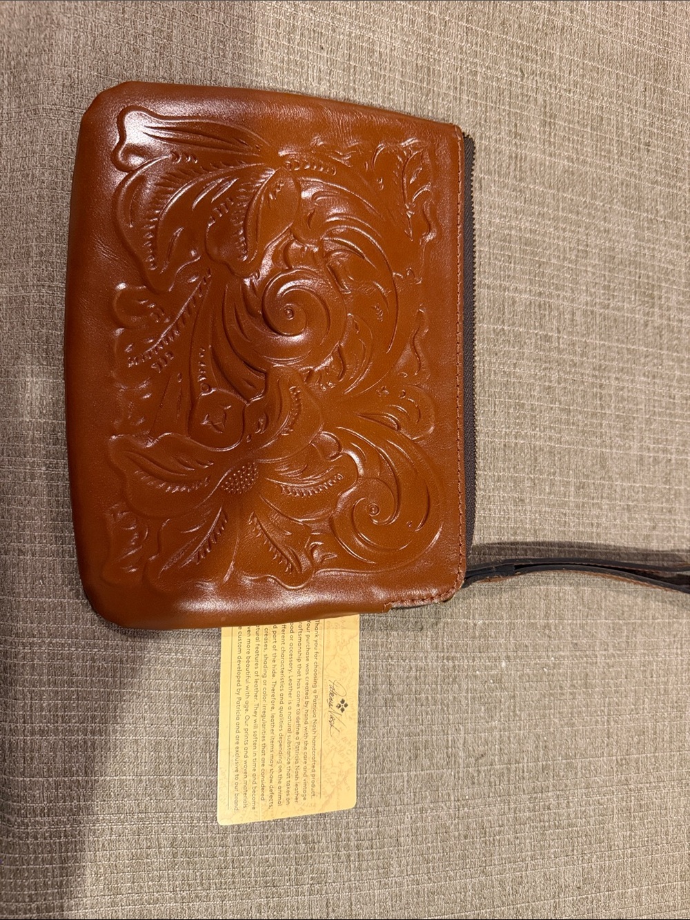 Patricia Nash Embossed Leather Wristlet in Brown